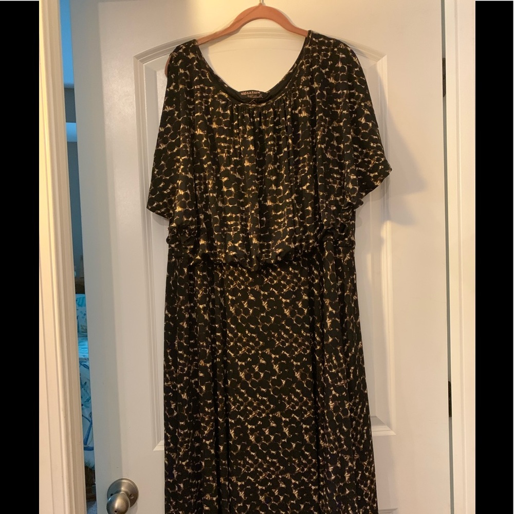 Brand new without tags, never worn. Cap sleeve design.